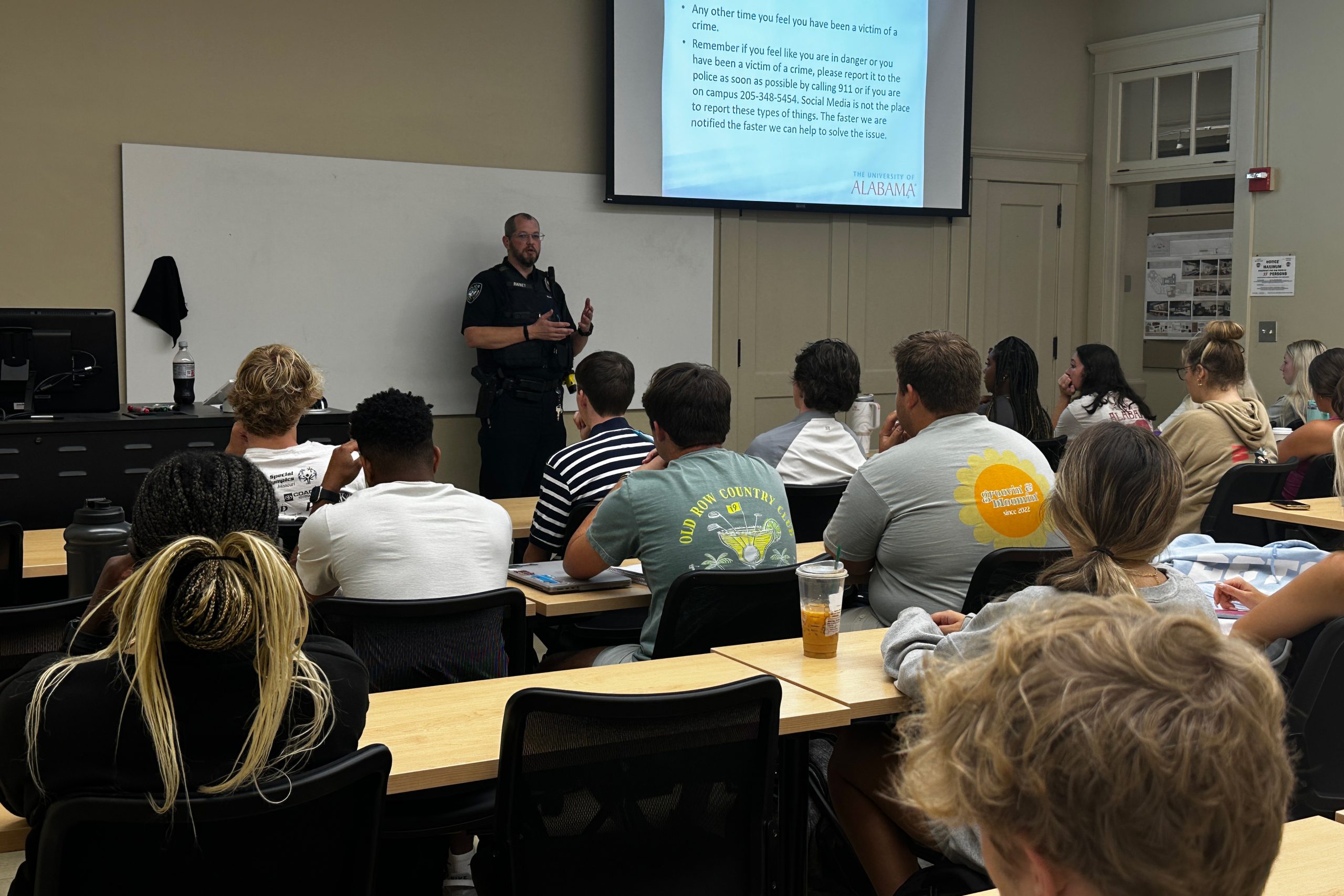 Police Officer speaking to a University of Alabama classroom