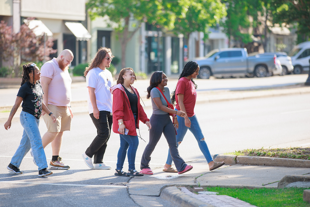 Image of students walking on a pedestrian pathway