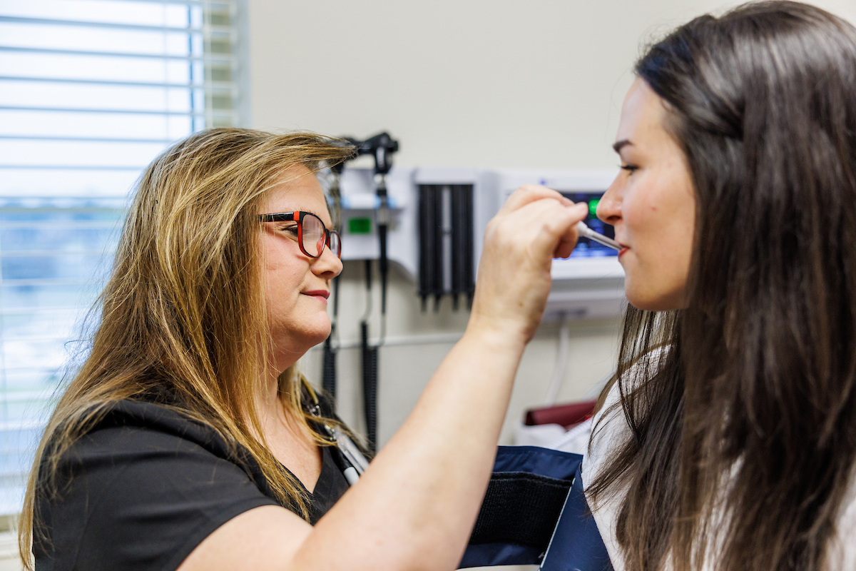 Image of student and health professional at the Student Health Center